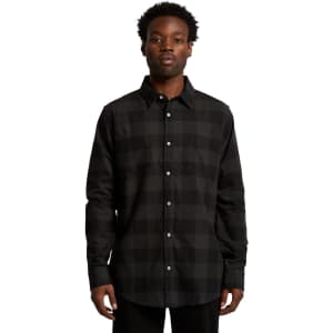 A black and grey check shirt with a button-up front and a collar, featuring a branded logo.