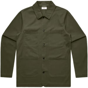 An olive green chore jacket featuring a collared neck and four front pockets. The jacket has a logo on the label.