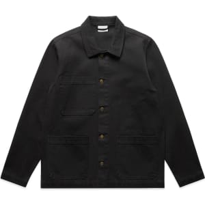 A black Canvas Chore Jacket featuring a button-up front and multiple pockets, along with a branded label.