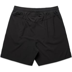 A pair of black sports shorts featuring an elastic waistband and a back pocket, with a logo on the fabric.