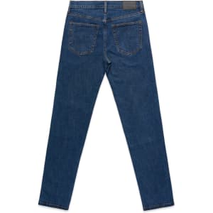 A pair of dark blue standard jeans viewed from the back, featuring five pockets and a branding label.