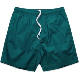 Teal beach shorts featuring an elastic waistband and drawstring detail. Includes a logo on the waistband.
