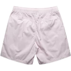 Light pink beach shorts with an elastic waistband, featuring a simple design and no visible branding.