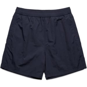 Navy blue swim shorts featuring an elastic waistband and a simple design. Includes a branded logo.