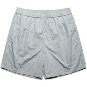 Light grey swim shorts featuring an elastic waistband and a simple design. Includes a logo.