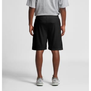 Black sports shorts with an elastic waistband, featuring a logo on the side.