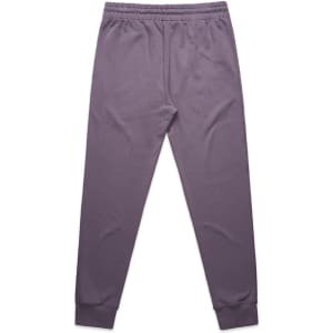 Premium track pants in a soft purple colour with an elastic waistband and cuffs at the ankles. Features a logo.