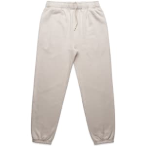 Light beige track pants with an elastic waistband and cuffs. The pants have a drawstring and feature a logo.