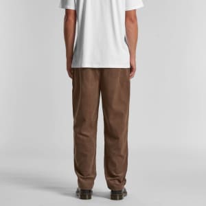 Brown corduroy pants with a loose fit, displayed from the back, paired with a plain white t-shirt.