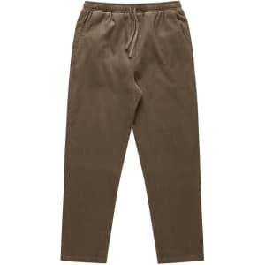 Cord Pants in a muted brown colour, featuring an elastic waistband and drawstring, designed in a relaxed fit.
