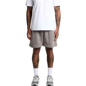 A person wearing grey Relax Faded Track Shorts, standing upright in a white t-shirt and athletic shoes.