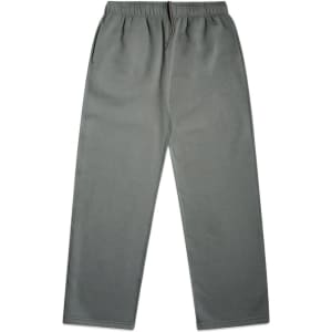 Cuffless track pants in grey with an elastic waistband and side pockets, featuring a branding logo.