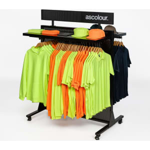 A display rack featuring orange and lime green garments, along with navy blue and brown hats. It has a branded logo.
