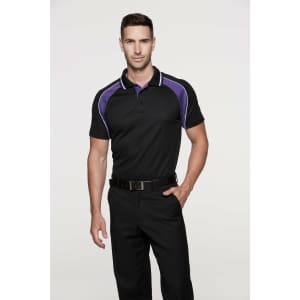 A black men's polo shirt featuring purple accents and a logo, worn by a model standing confidently.