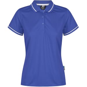 A blue women's polo shirt featuring a collar, three buttons, and contrasting white trim. It has a branded label.