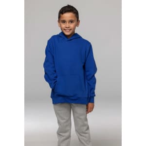 A child wearing a blue hoodie with a front pocket, paired with grey pants, standing against a neutral background.