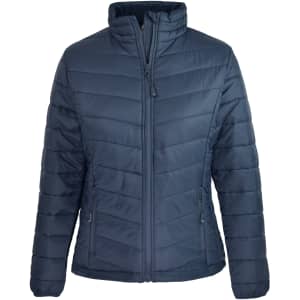 A navy blue BULLER LADY JACKET with a zip front and textured quilted design. It features side pockets and a stand-up collar.
