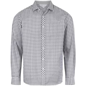 A long-sleeved button-up shirt in a black and white check pattern, featuring a branded logo.