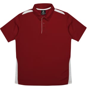 A red polo shirt with white side accents and a collar, featuring a logo on the neckline.