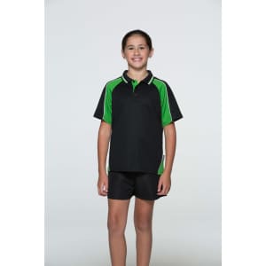 A black polo shirt with green accents. The model is smiling, wearing the shirt with black shorts.