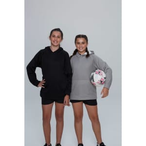 Two girls pose in CRUSADER KIDS HOODIES, one in black and the other in grey, holding a sports ball.