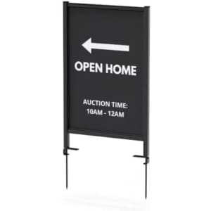 A large steel lawn sign featuring a black background, an arrow, and text for an open home auction event.