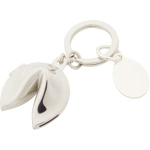 A silver fortune cookie keyring with a smooth finish and a circular keyring attachment.