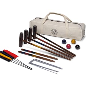 A backyard croquet set featuring wooden mallets, balls, wickets, and a carrying case in cream.