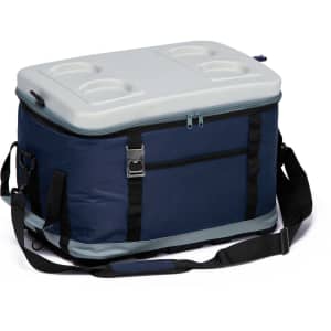 A navy blue cooler bag with a grey lid, featuring cup holders and a shoulder strap. It has a front pocket and a branding logo.