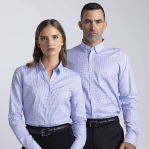 A women's button-up shirt in light blue and white check pattern, featuring a collar and long sleeves.