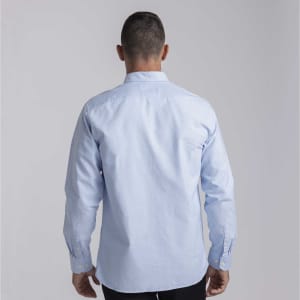 A light blue men's button-up shirt with long sleeves and a logo on the back.