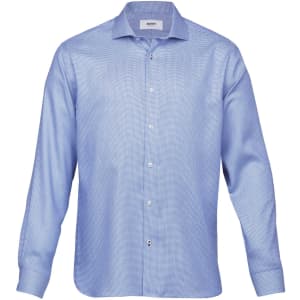 A light blue button-up shirt with long sleeves and a collar, featuring a logo on the chest.