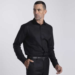 A black button-up shirt for men, featuring a collar and long sleeves, with a discreet logo.