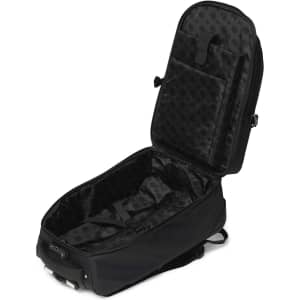 A black Voyager Trolley Backpack with an open compartment, featuring internal pockets and a padded back.
