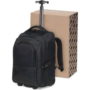 A black trolley backpack with wheels and a retractable handle beside a cardboard box.