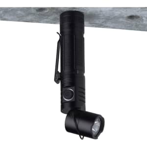 A black FlexLight Torch with an adjustable head and a clip for attachment, designed for portable lighting.