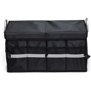 A black storage organiser with a folding lid and several front pockets, featuring silver reflective stripes and handles.