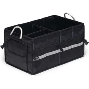 A black organiser with two compartments, several pockets, and rounded handles for easy transport.