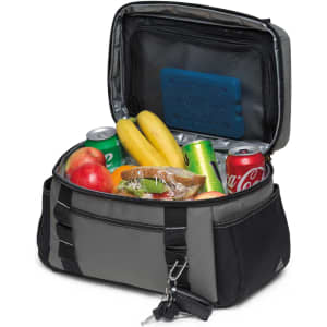 A hard hat cooler bag in grey and black, filled with drinks, fruit, and a sandwich, with a key attached.