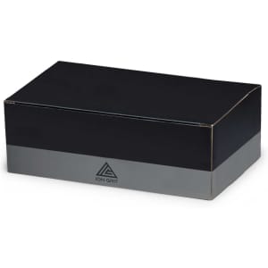 A rectangular black box with a grey stripe at the bottom, featuring a logo on the front.