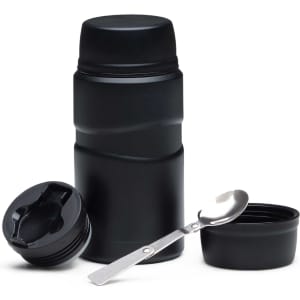 A black food jar with a lid and a small spoon, featuring a sleek design and a built-in separator.