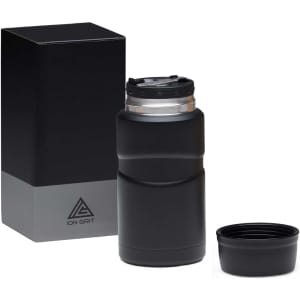 A black food jar with a screw-on lid and removable inner container, accompanied by a black box.