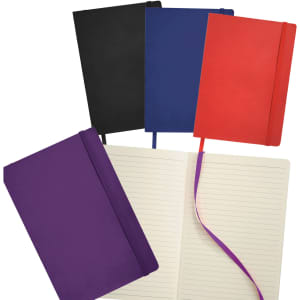 A collection of Pedova Soft Bound JournalBooks in black, navy, red, and purple, with a blank lined interior.