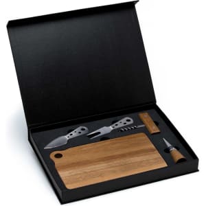 A cheese board set featuring a wooden board and stainless steel knives, presented in a black box with a logo.