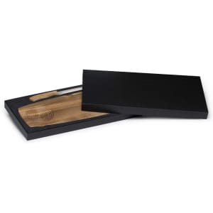 An elegant wooden cheese board set in a black gift box, featuring a knife and a circular groove for serving.
