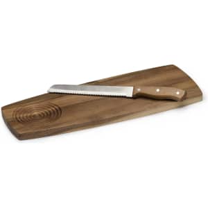 A wooden cheese board with a smooth finish and a serrated knife, showcasing natural tones and a circular design.