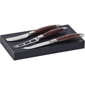 A set of three cheese knives with polished stainless steel blades and wooden handles, presented in a black box.