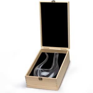 A glass Barolo wine decanter in a wooden box with a black interior, featuring a sleek, elegant design.