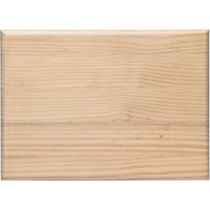 A wooden cutting board with a smooth, natural finish featuring light, pale wood tones and a simple design.