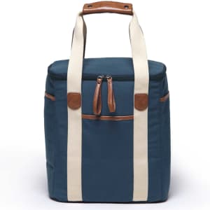 A drink cooler with a teal exterior, cream straps, and brown leather accents, featuring a zippered closure and pocket.